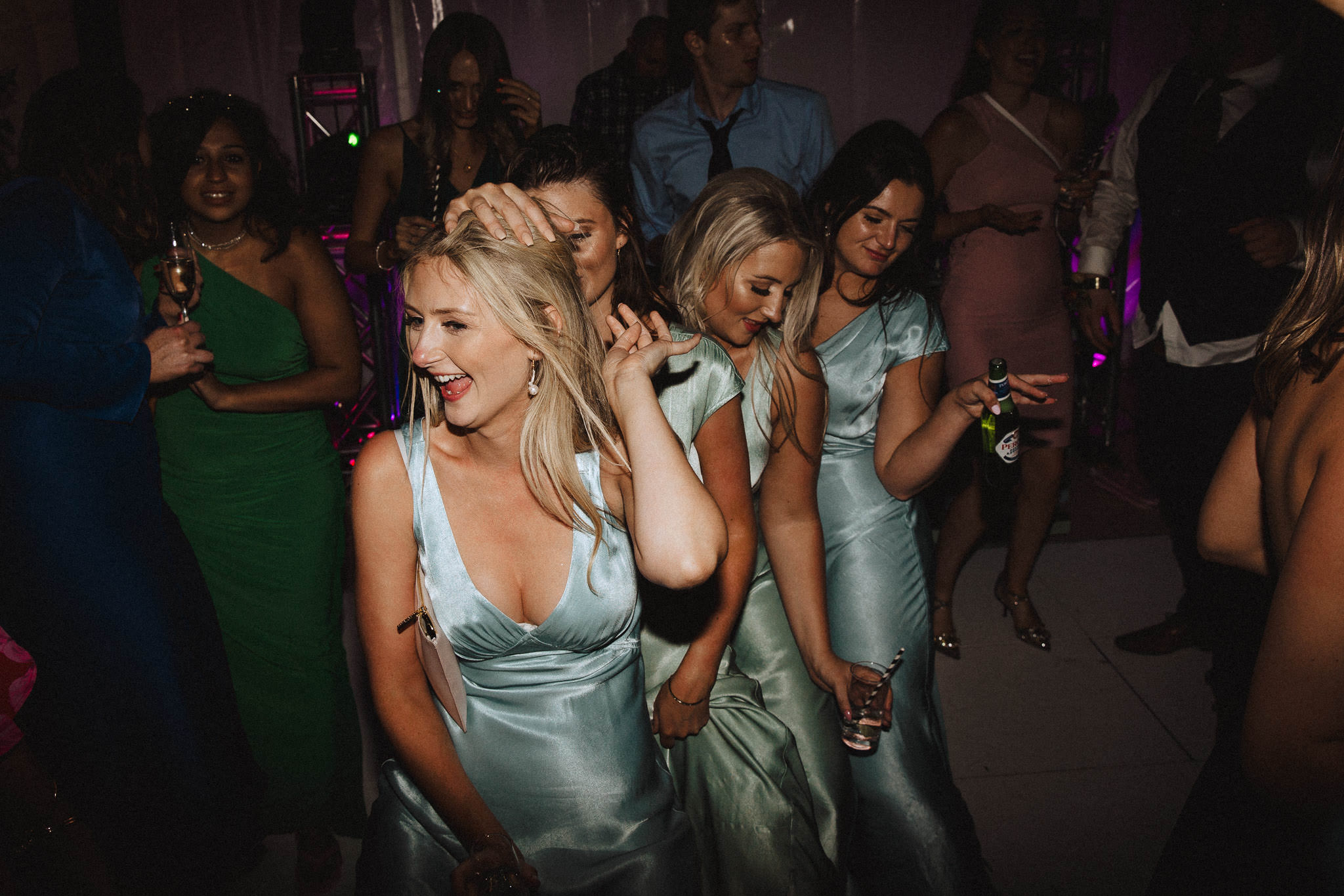 bridesmaids doing the conga