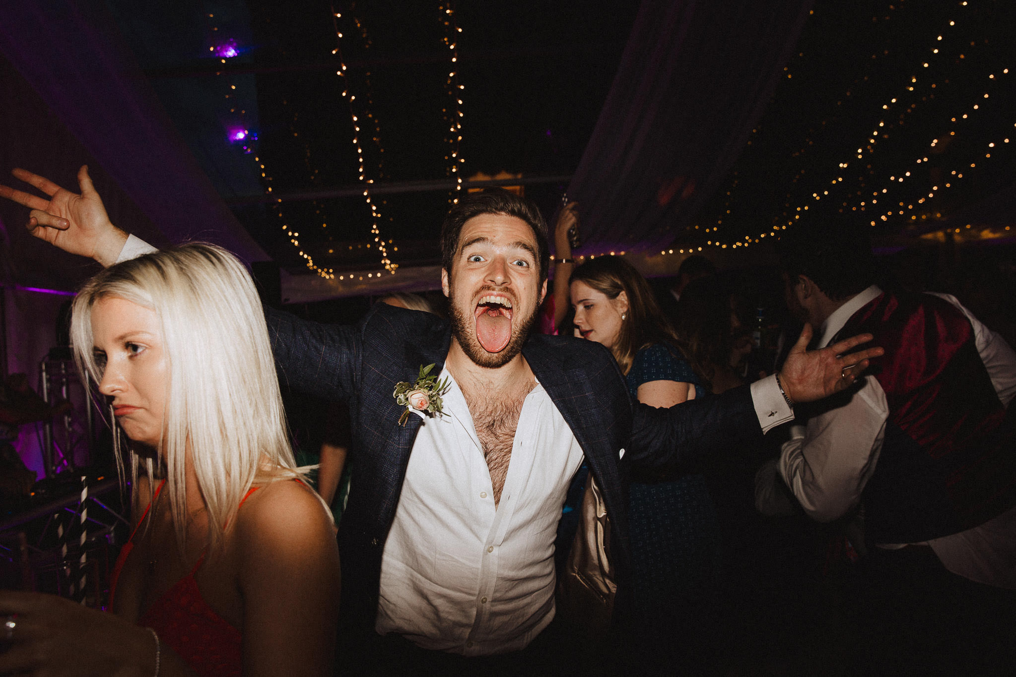 groomsman going crazy on the dance floor