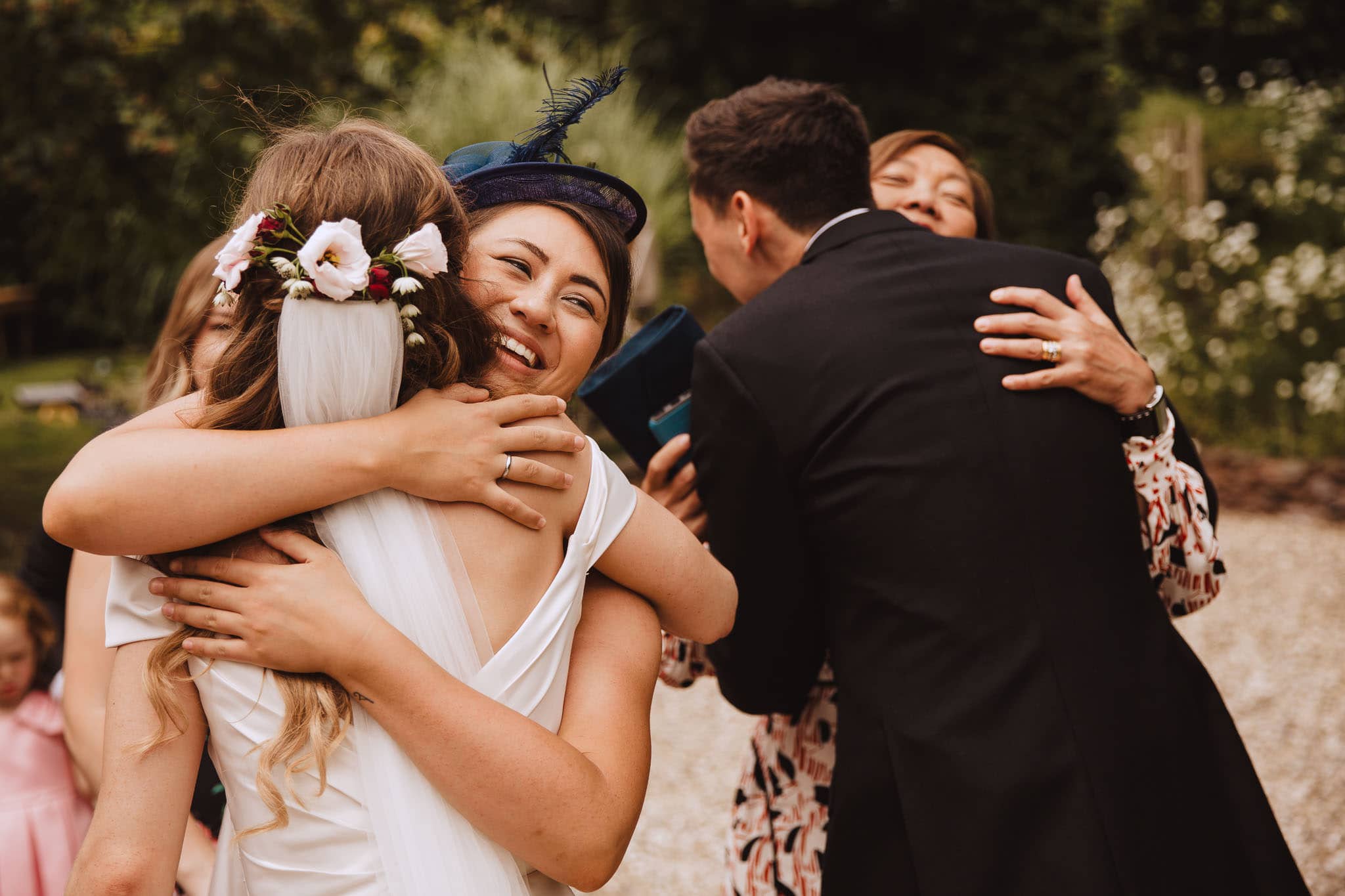 big cuddles for the bride and groom 