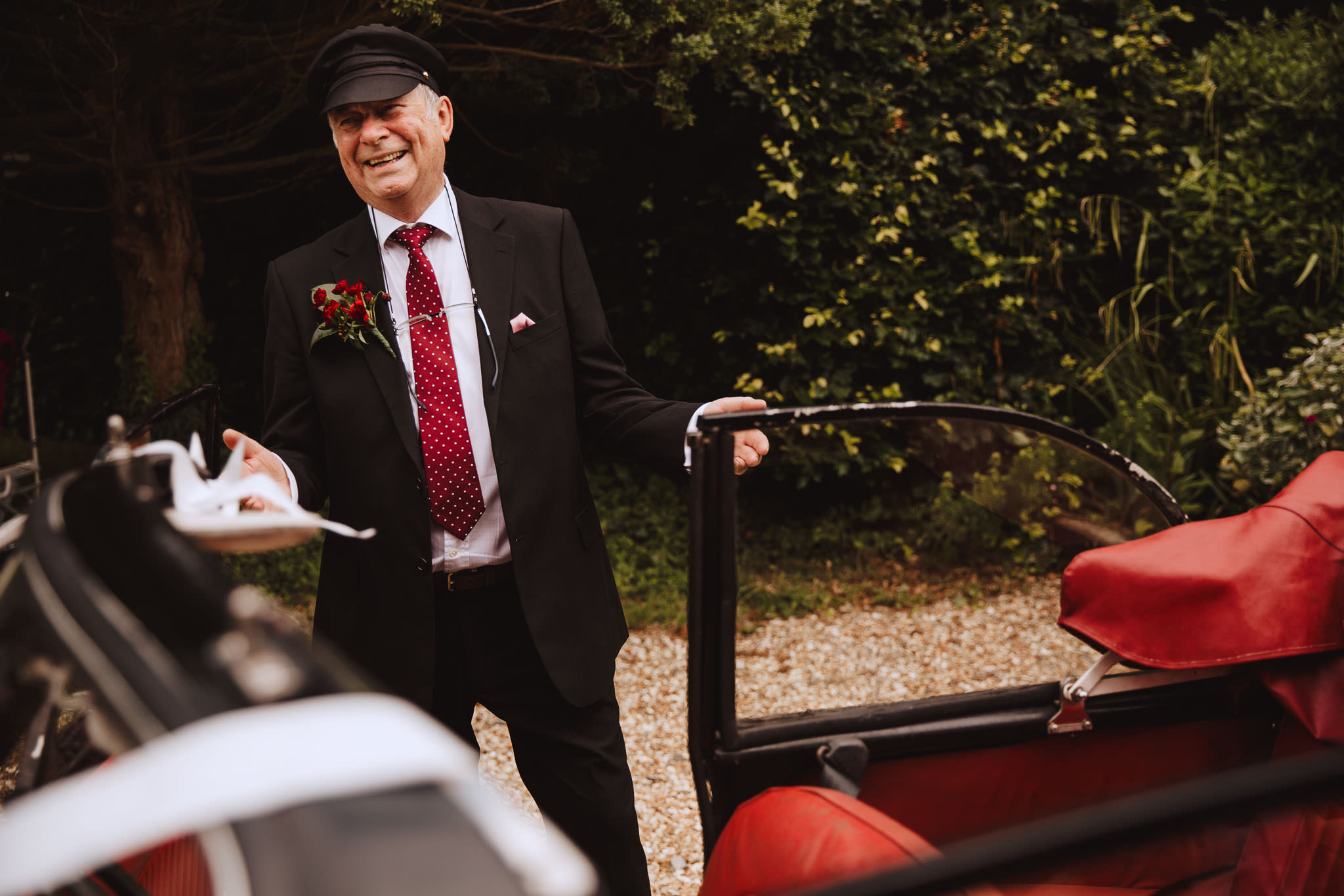 Dad playing chauffeur at a weddings driving a Morris Minor