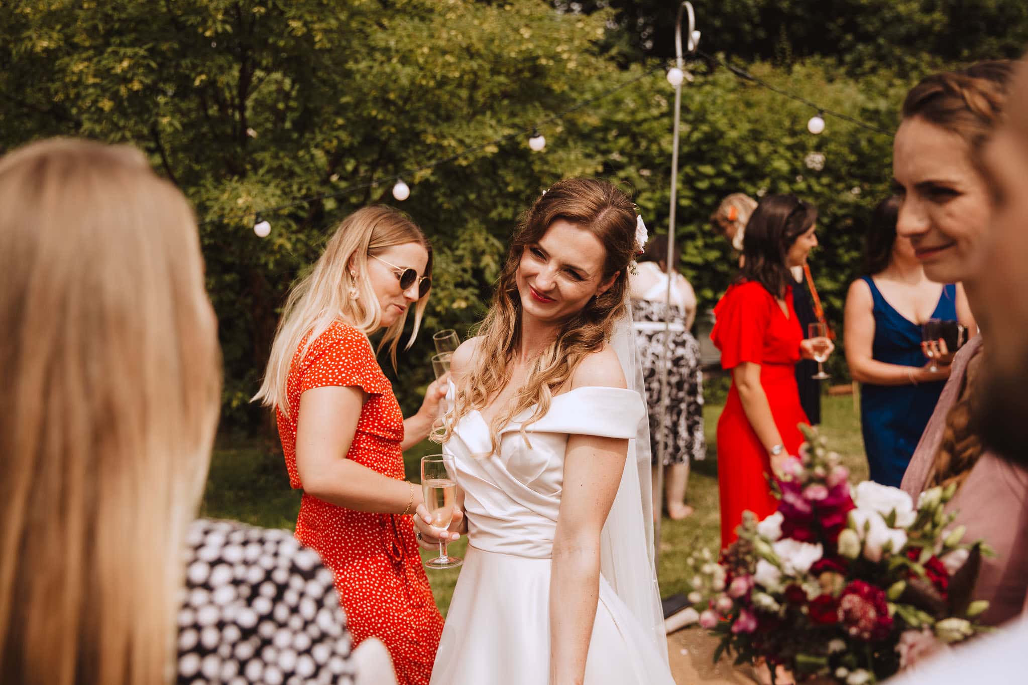 beautiful bride in wedding dress with bardot neckline