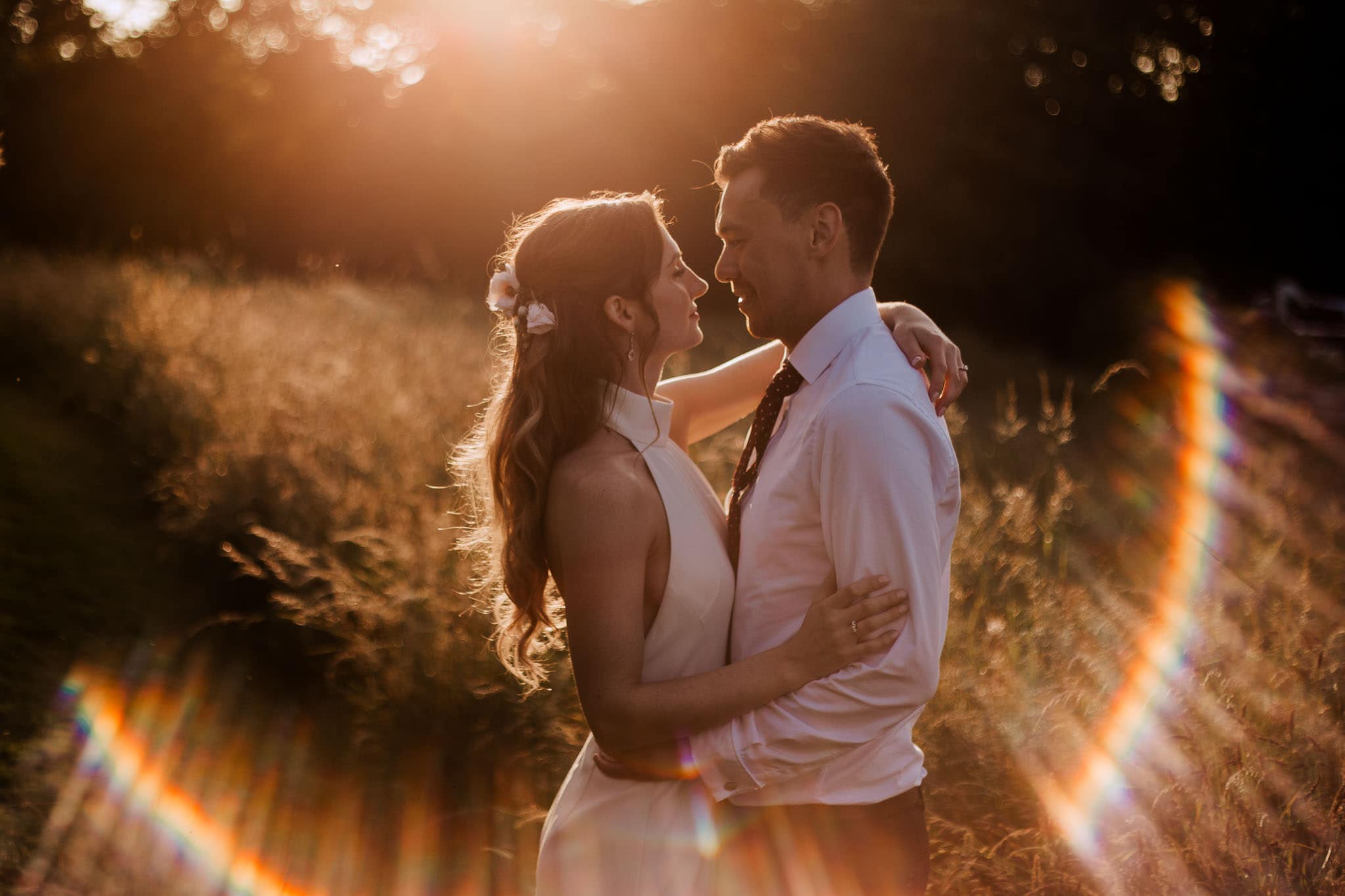 sunset portraits in wheat fields at a Marquee Wedding at Home