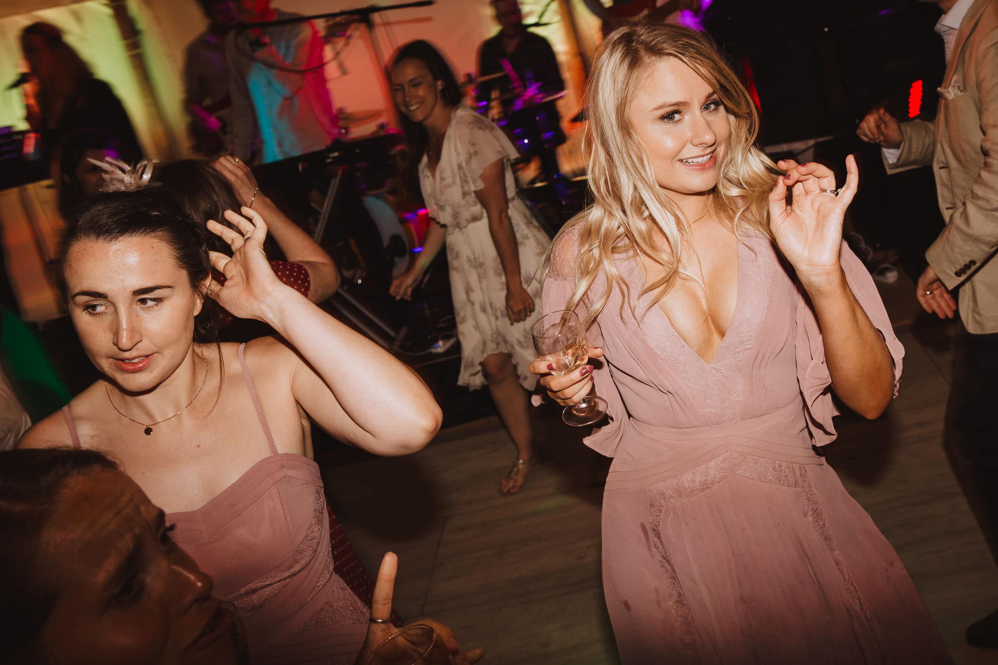 bridesmaids in pink dancing