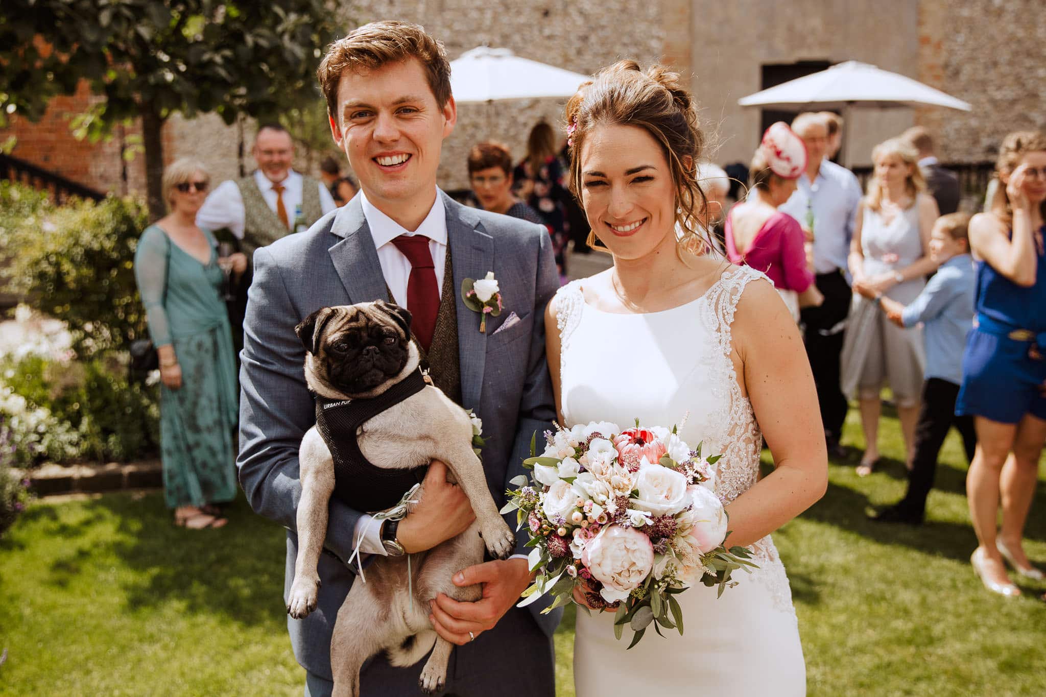 bride and groom with their pug at The Granary Estates Wedding