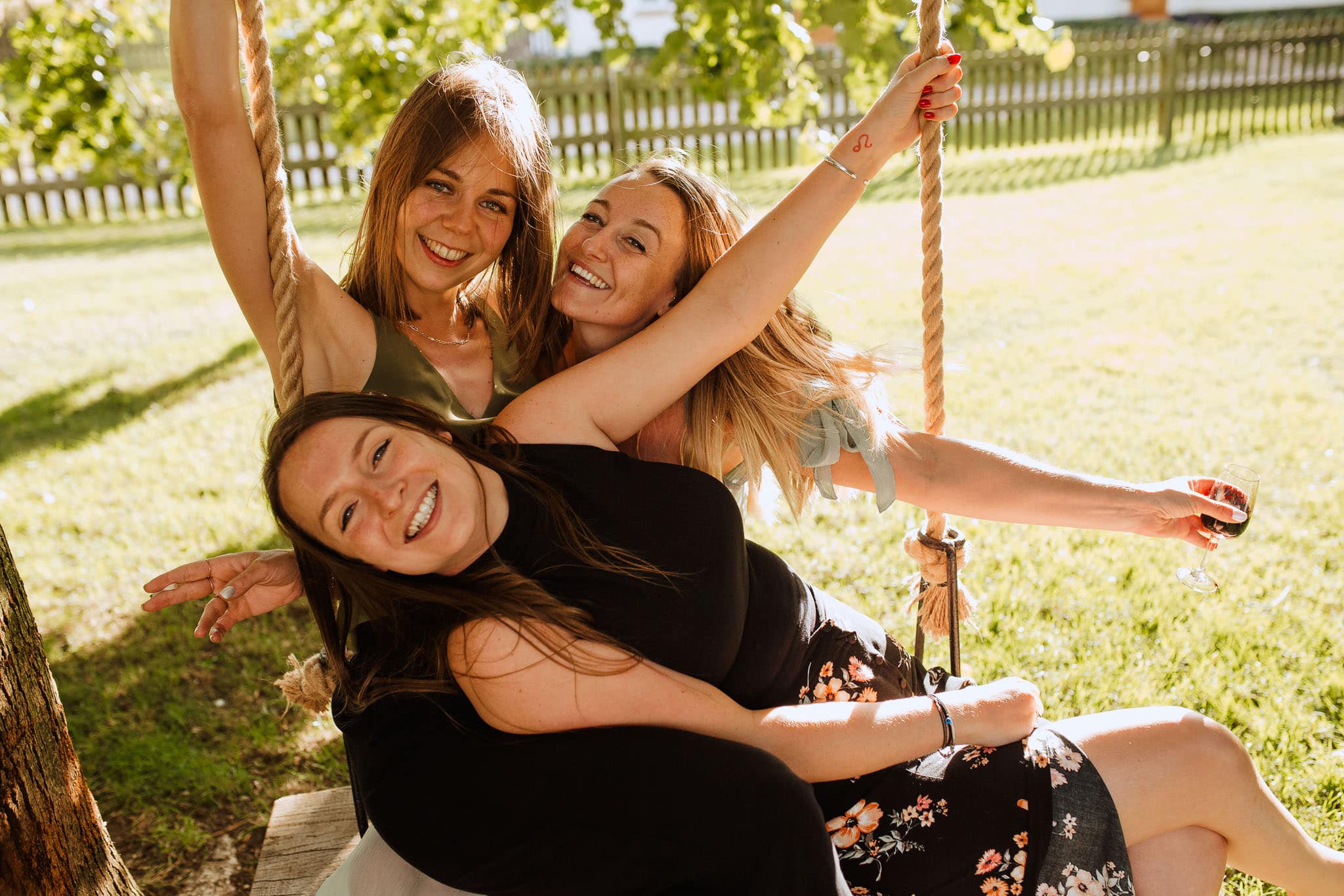 girls on swing at The Granary Estates Wedding