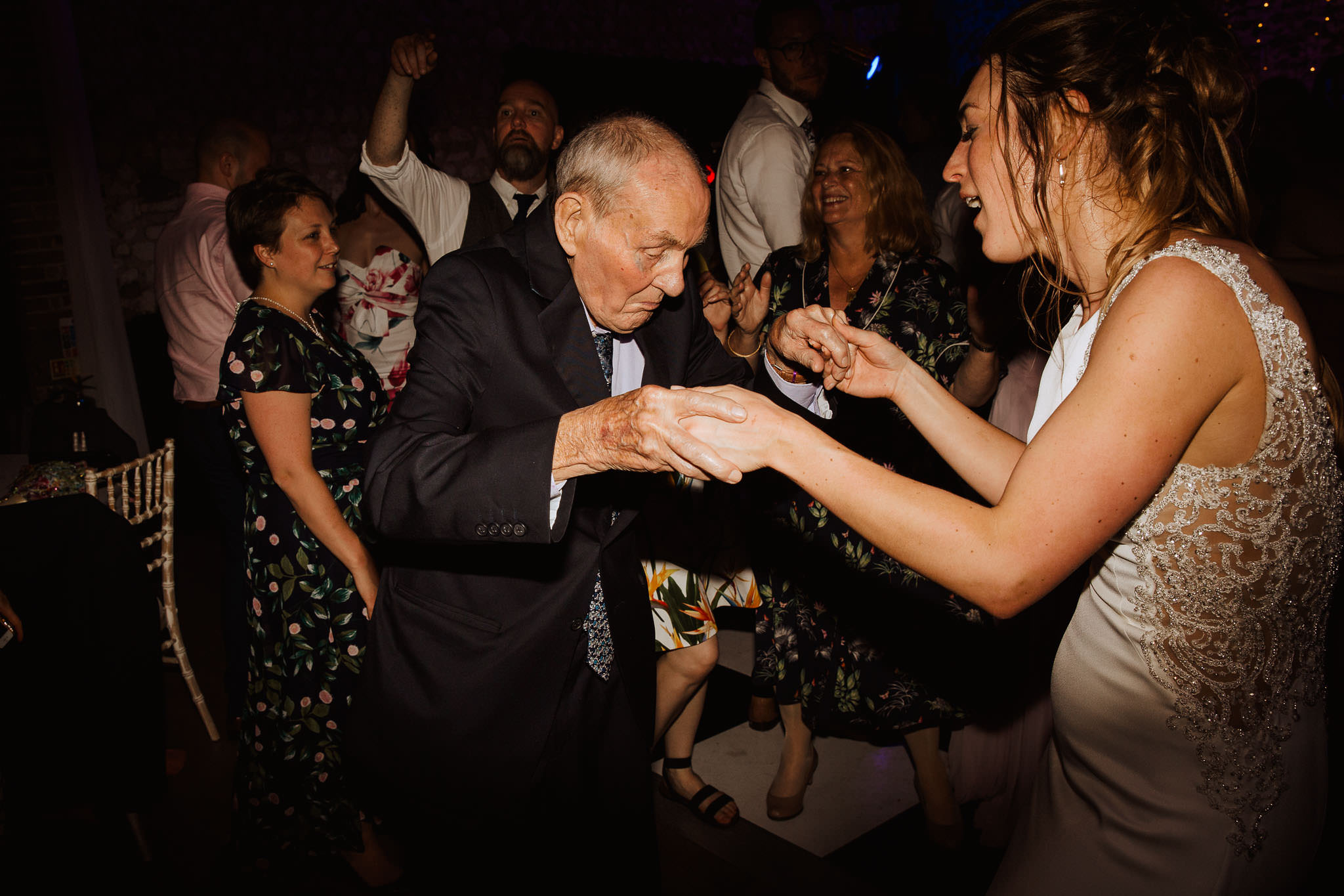 bride dancing with grandad