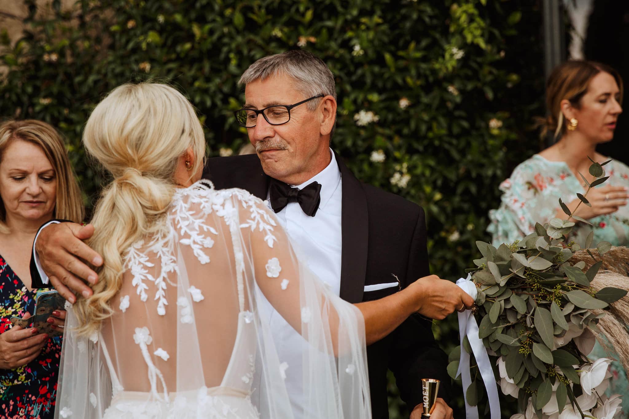 documentary wedding photographer catches emotional hug