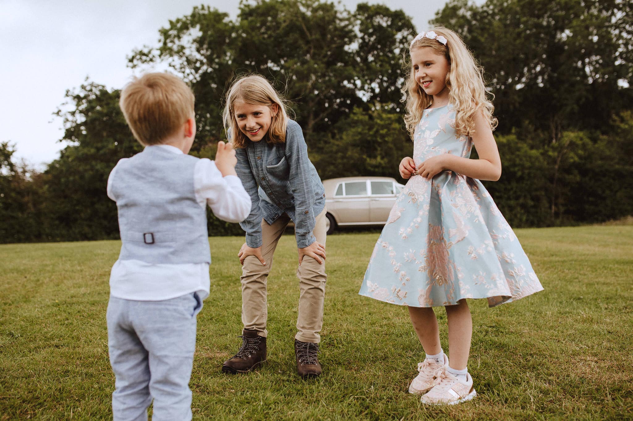  children playing documentary wedding photography