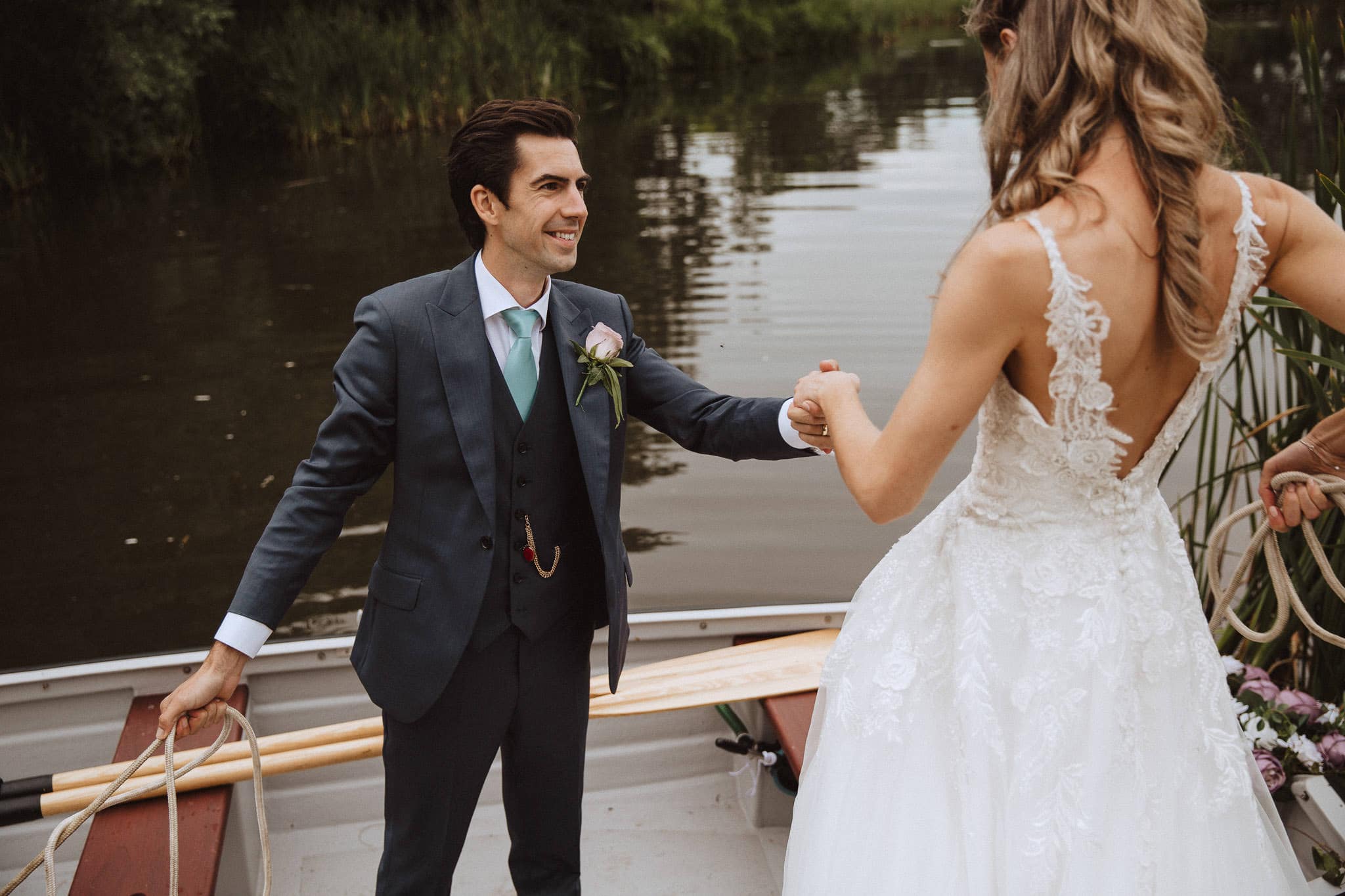 wedding by the lake at the bride's home in Leicestershire