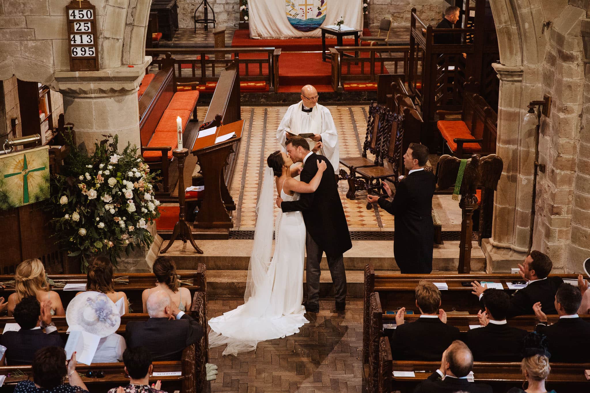 first kiss at Ashbourne Derbyshire church Wedding