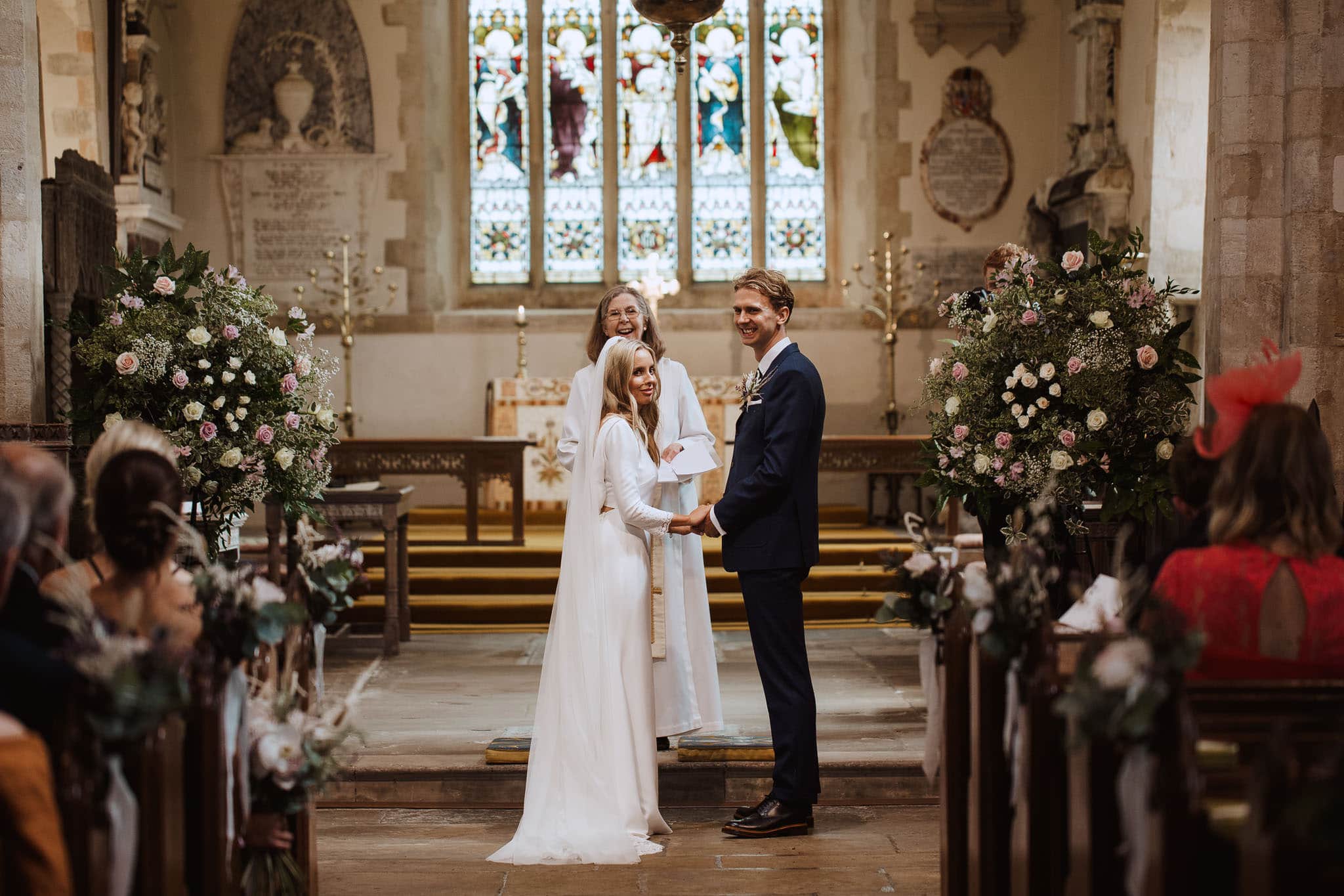 Rime Arodaky Bride with groom in blue wool suit