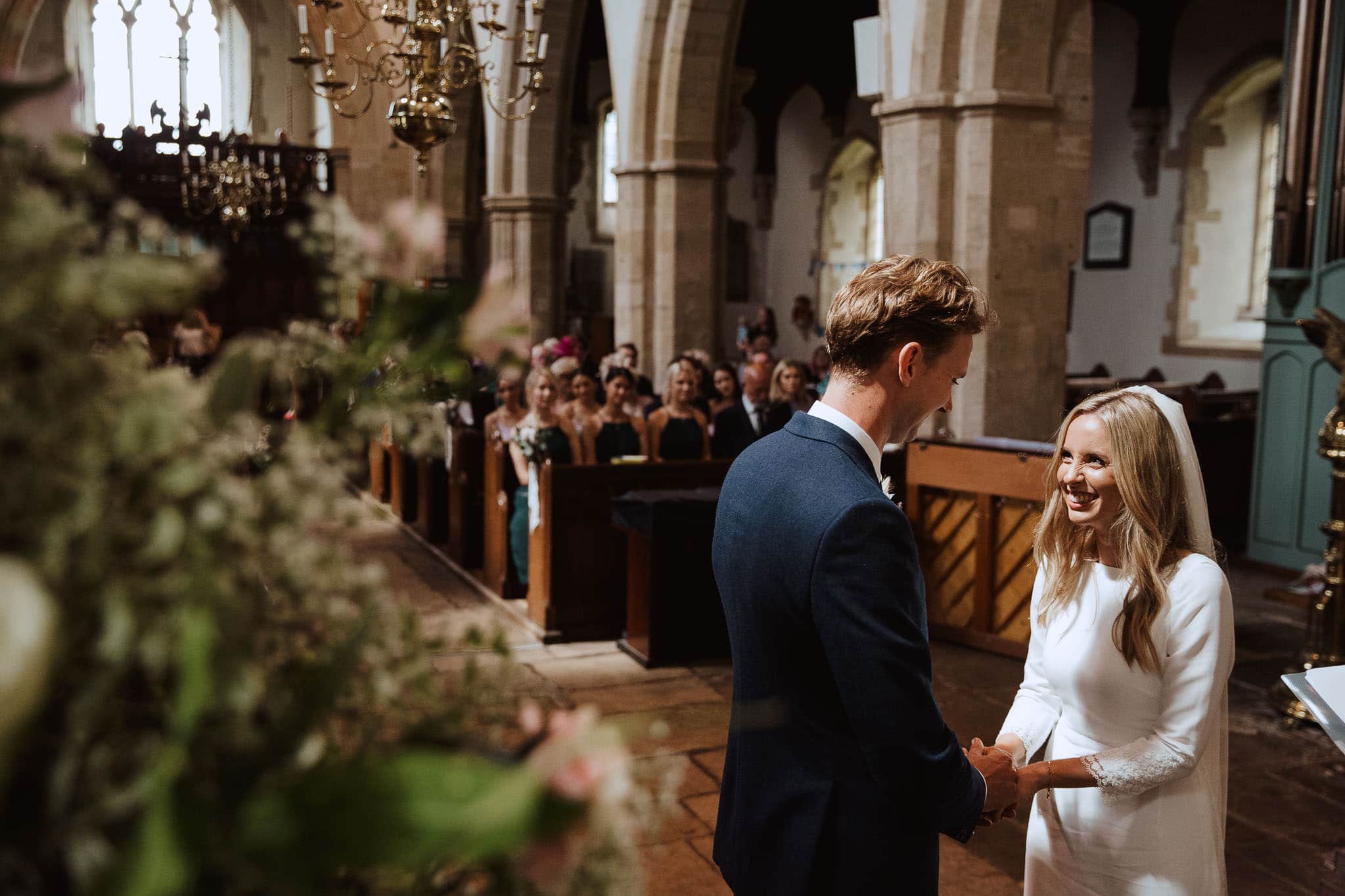 documentary wedding photography shot of the vows in the church