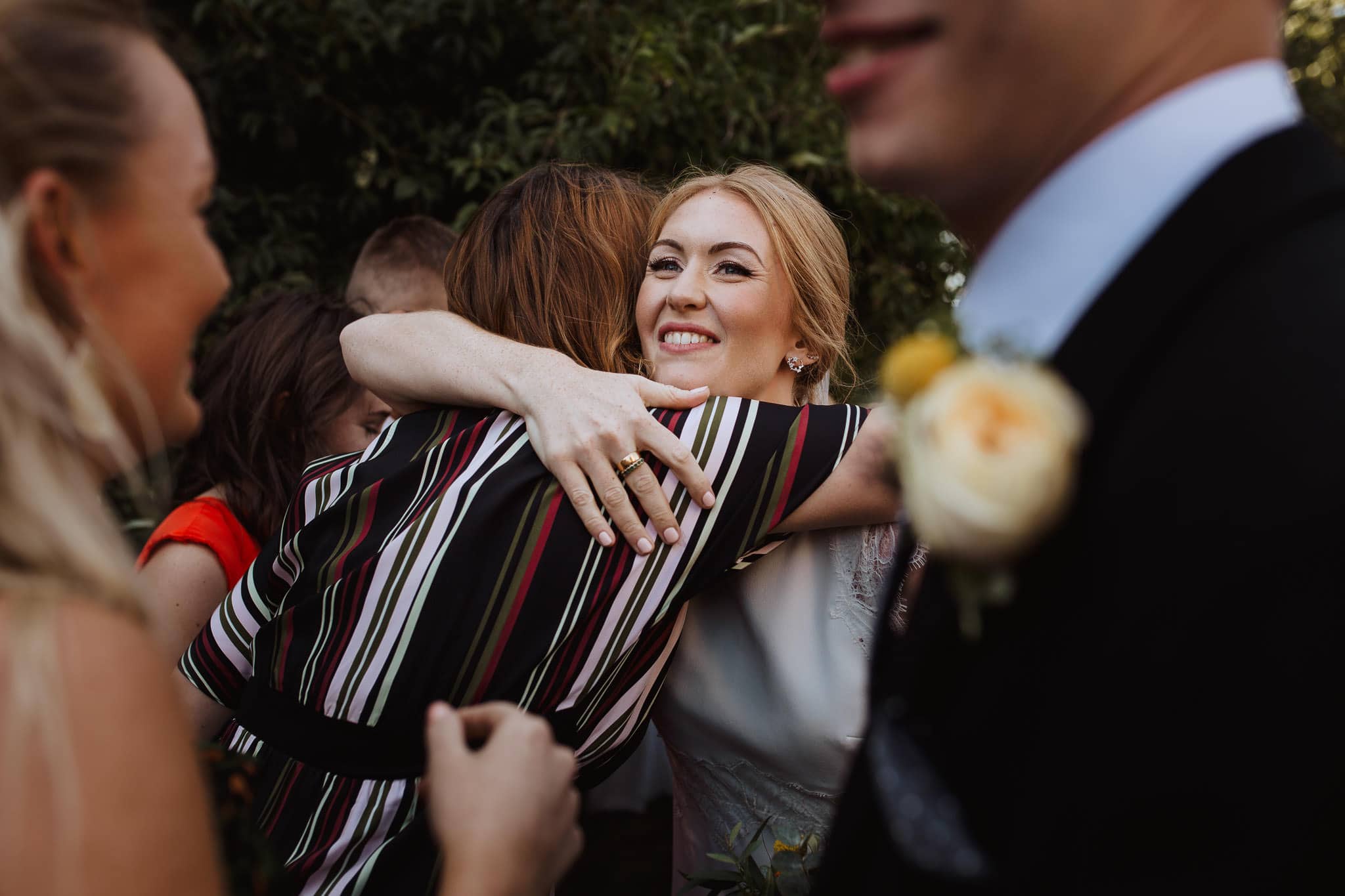 bride hugging her best friend