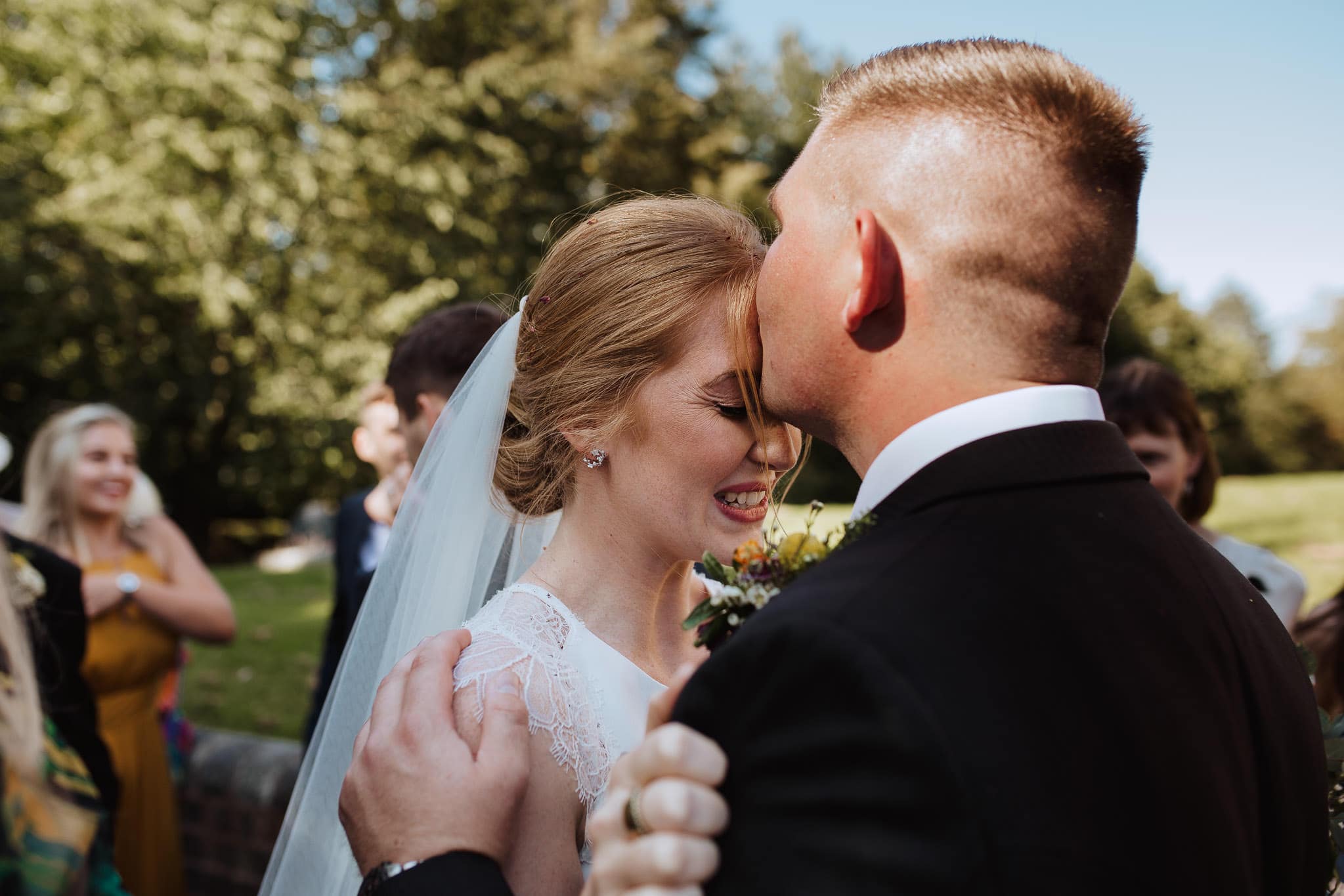 beautiful moment where brother caught in documentary photo congratulating the bride