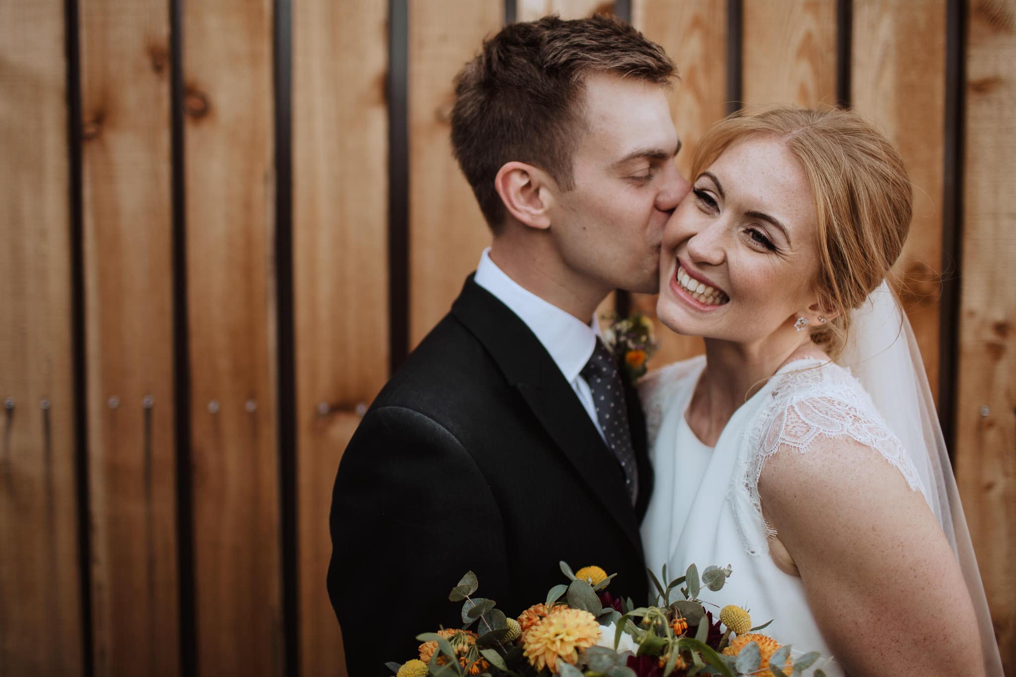 close up portrait of bride and groom at Norton Fields wedding