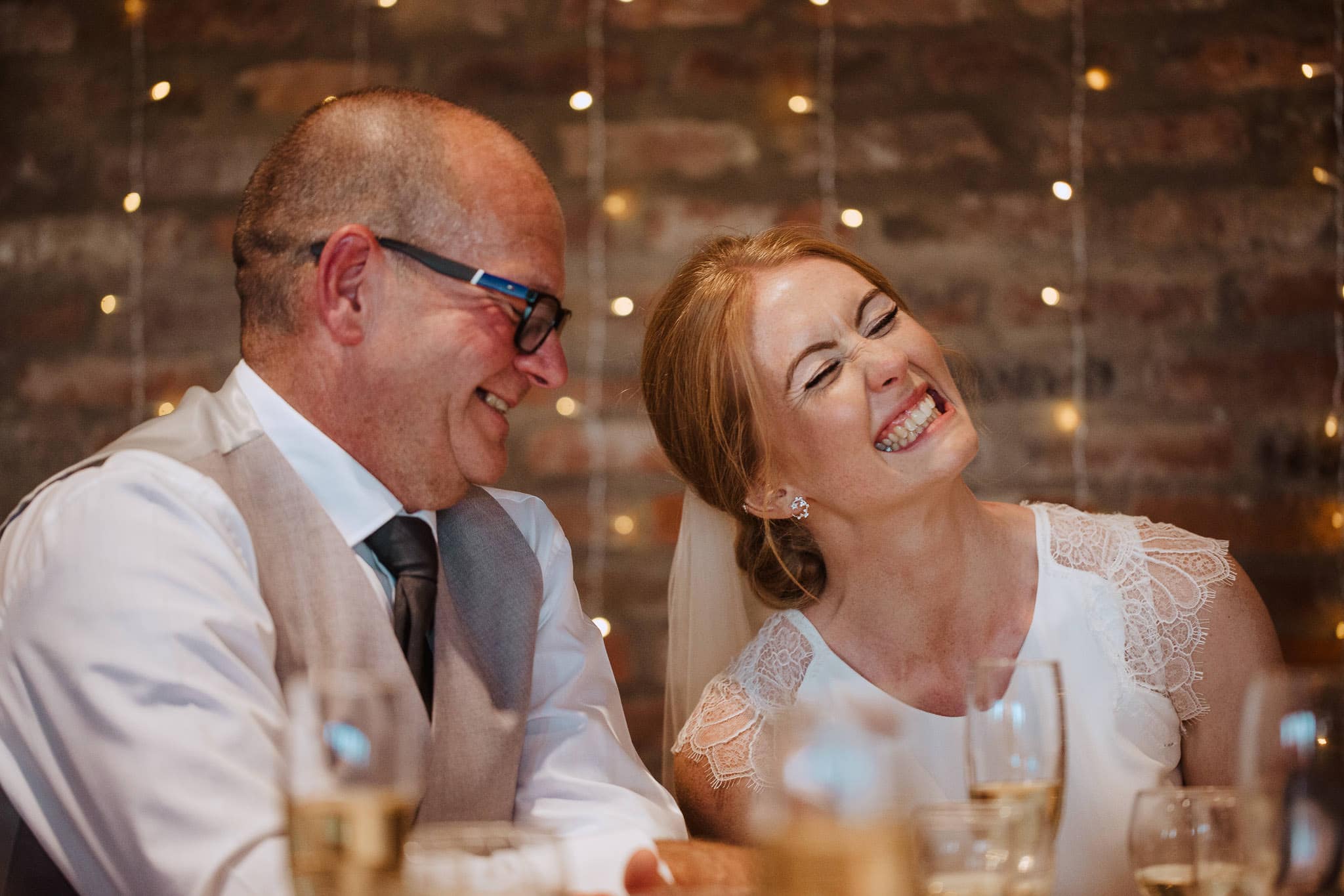 bride grimacing during speeches at Norton Fields wedding