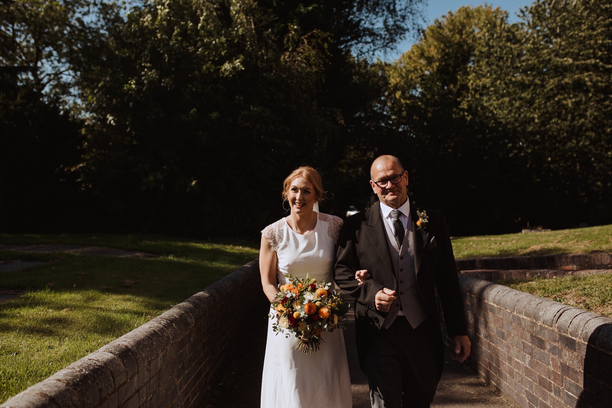 documentary shot of the bride arriving for the ceremony