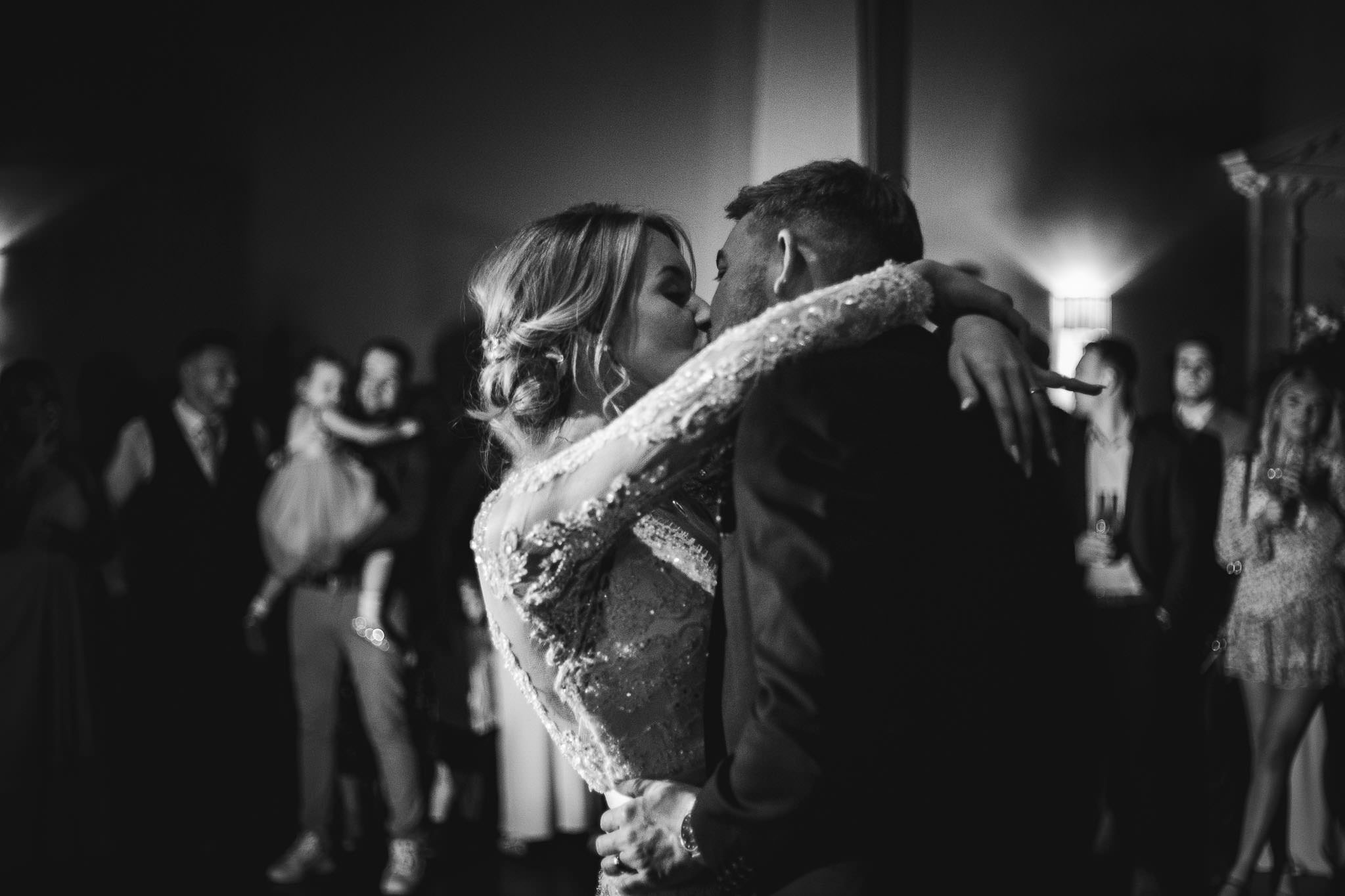 black and white close up shot of bride and groom's first dance