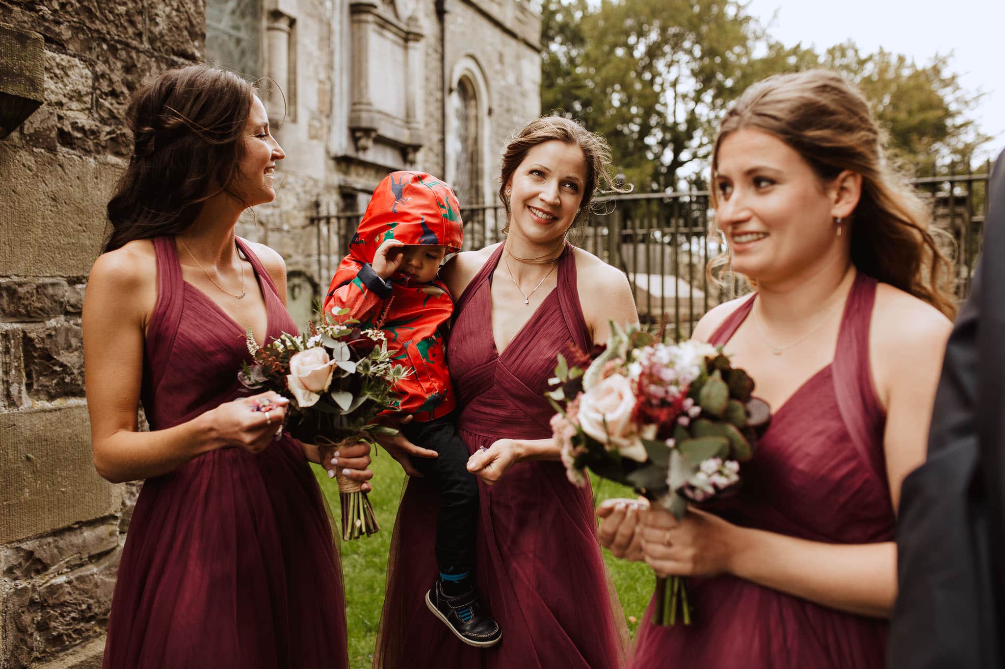 bridesmaids in dark red dresses Tissington Hall Wedding