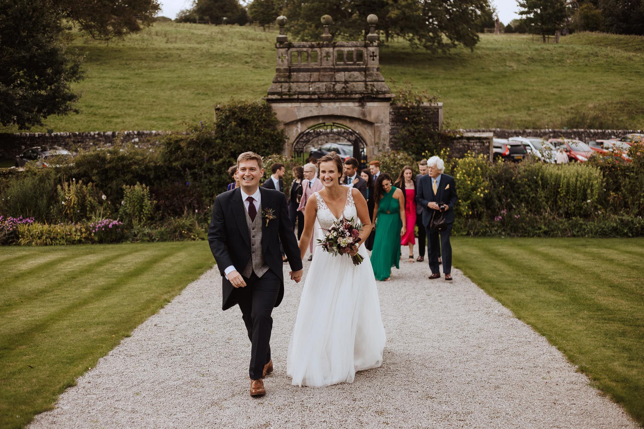 bride and groom arriving at Tissington Hall