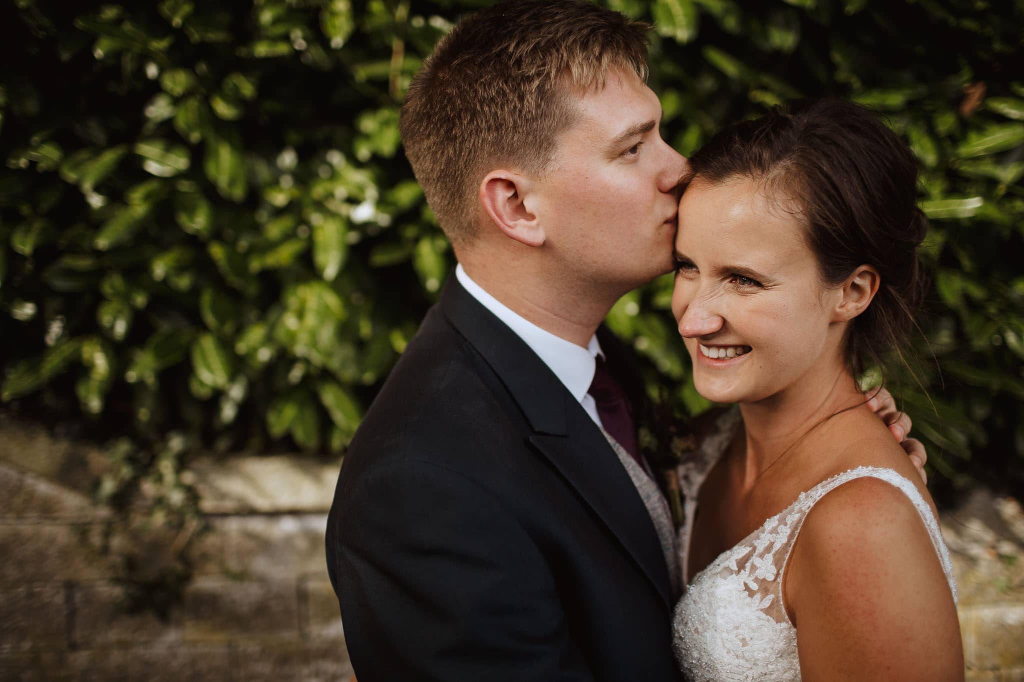close up portrait of bride and groom at Tissington Hall Wedding
