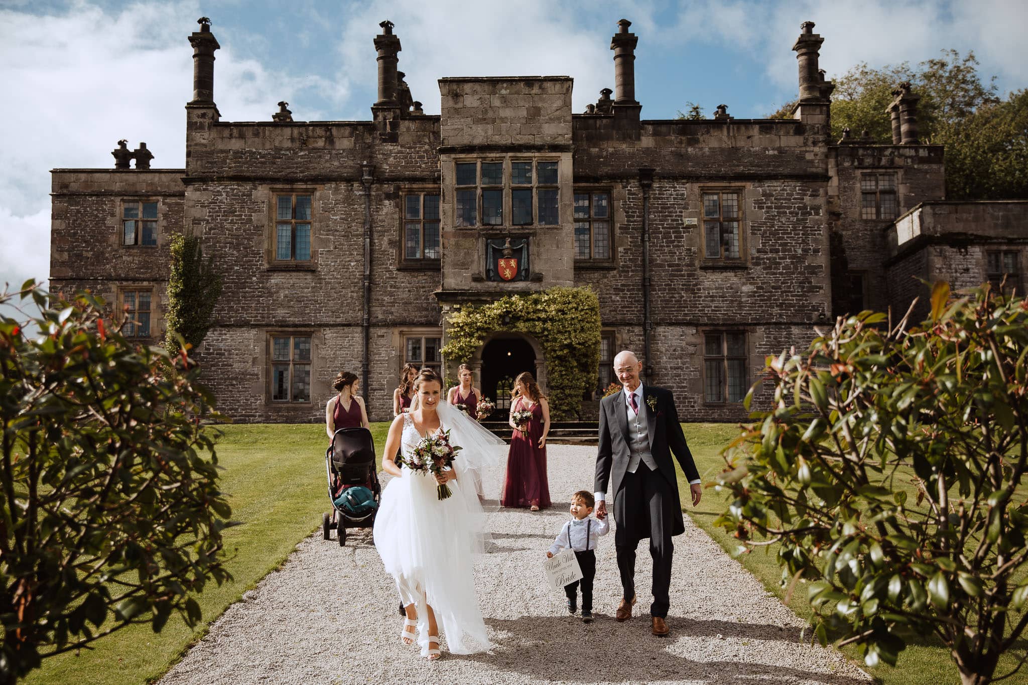 Tissington Hall Wedding bride walking to the Church