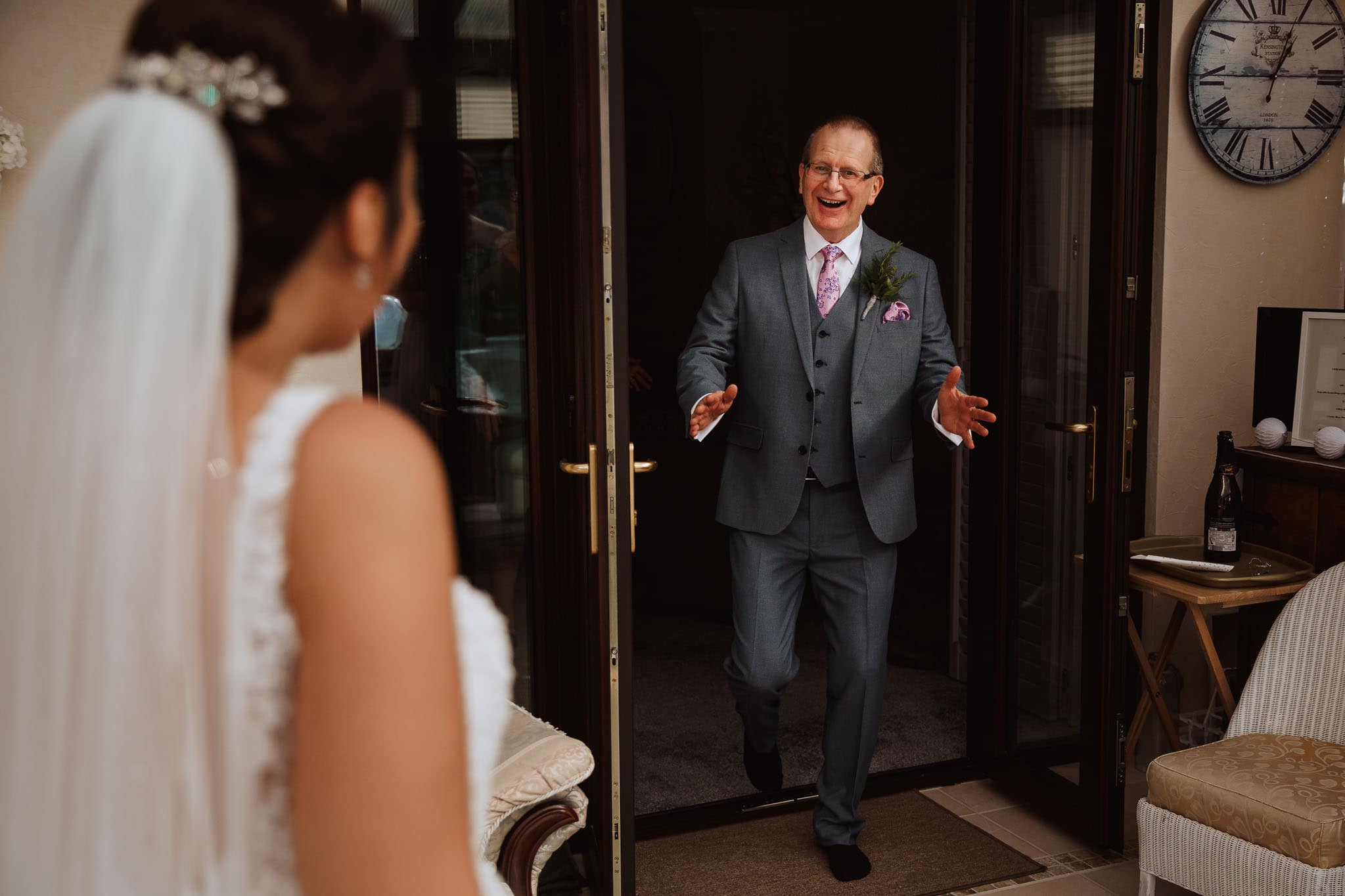 Dad's emotional reaction to seeing bride in her dress