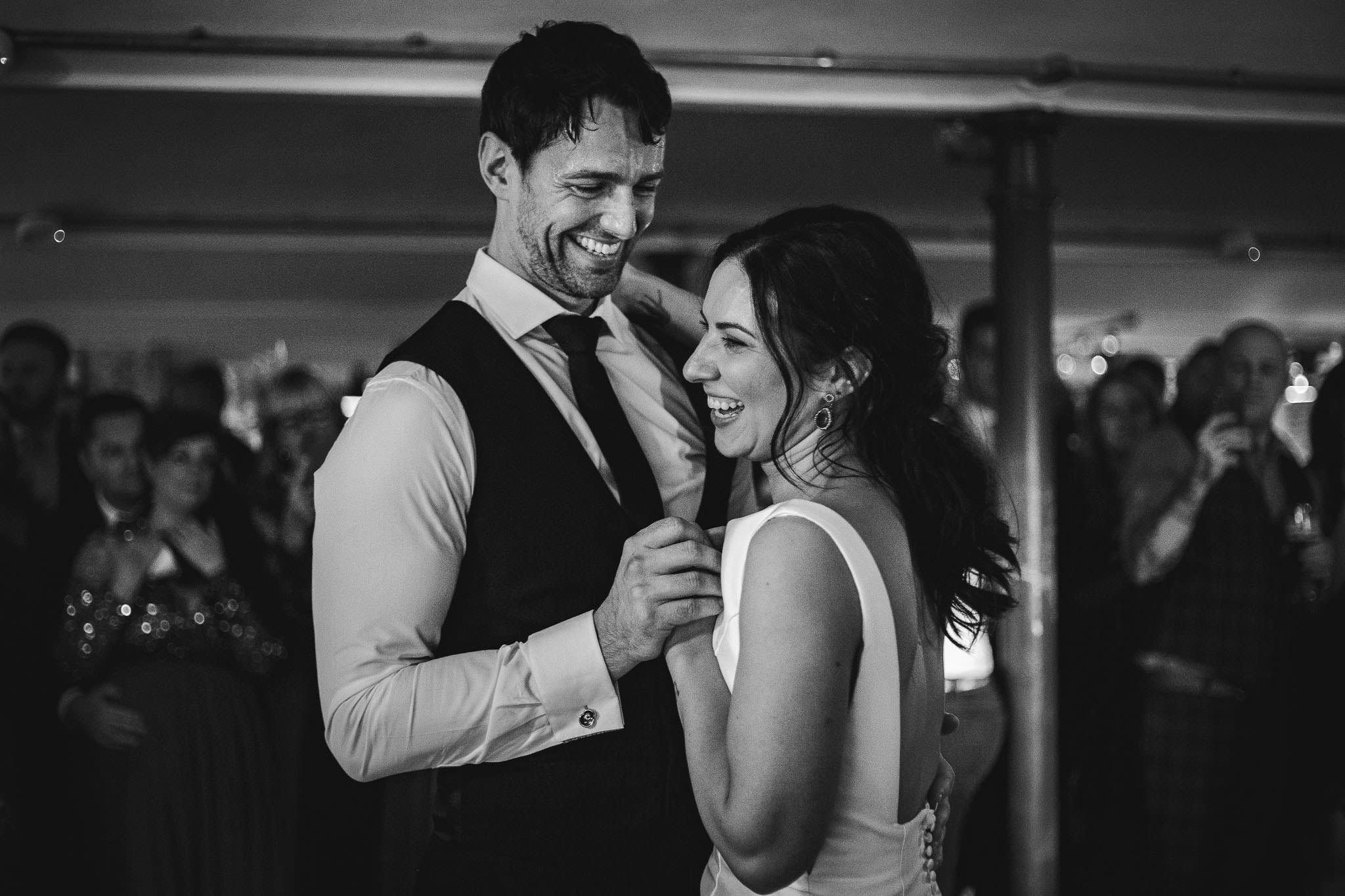 black and white shot of bride and groom's first dance at Derby Wedding, The West Mill