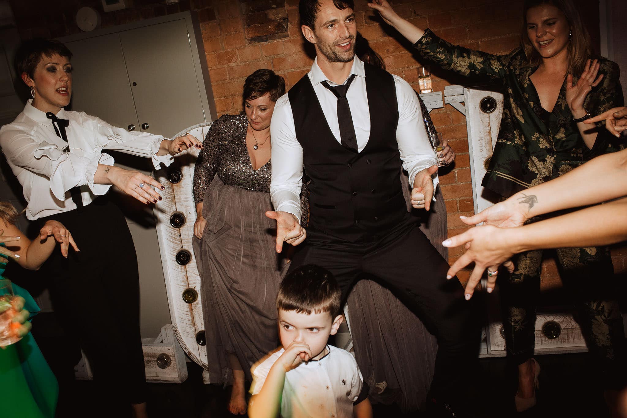 groom loving the dance floor at Derby West Mill wedding
