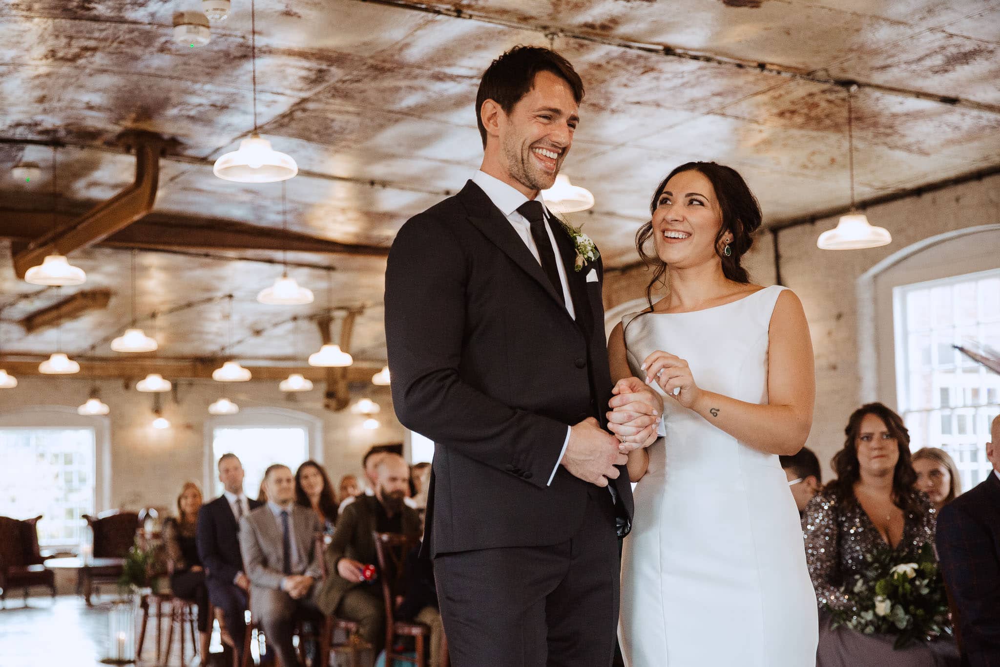 close up of gorgeous bride and groom during ceremony at The West Mill, Derby