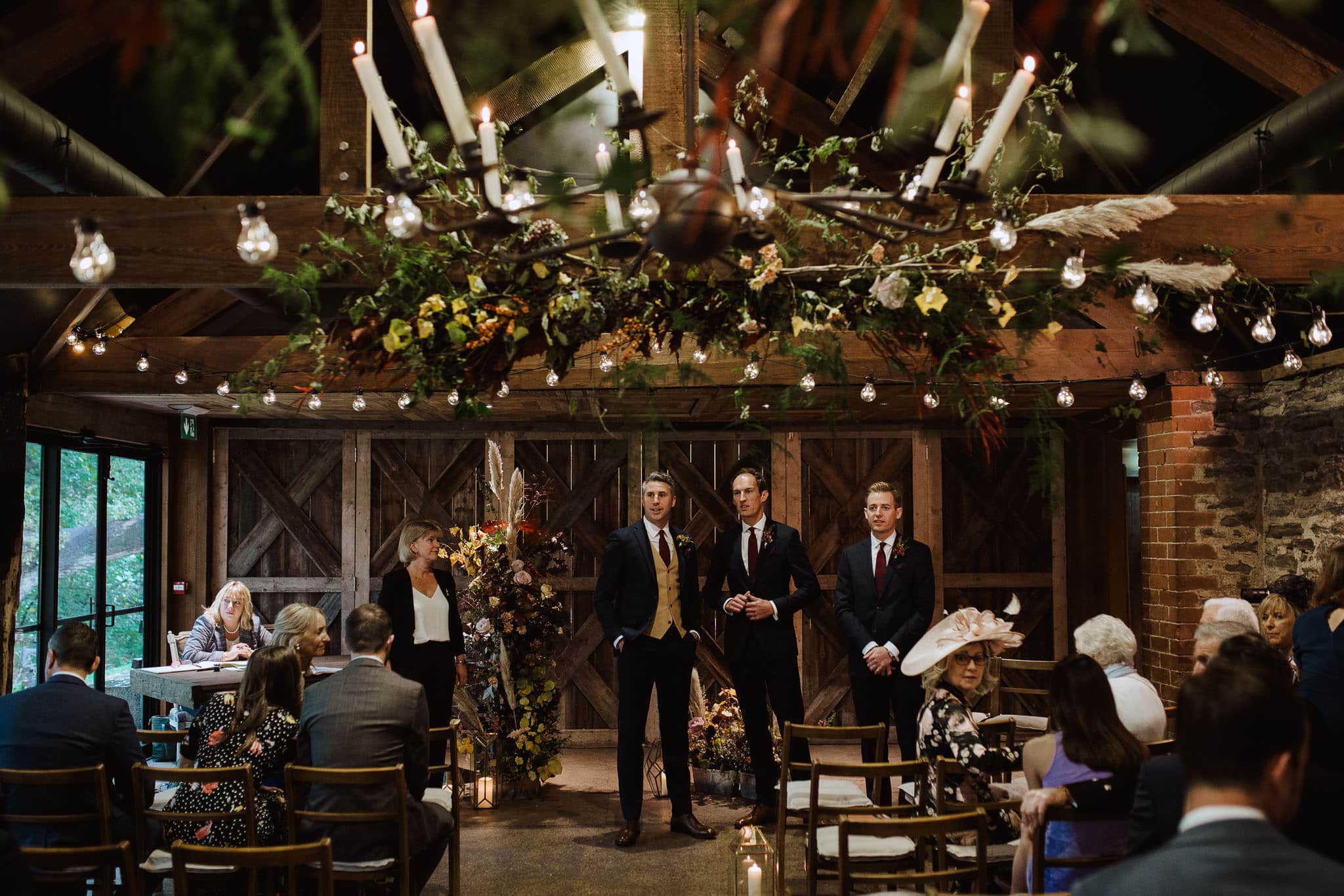 Dewsall Court, Herefordshire wedding ceremony in the barn