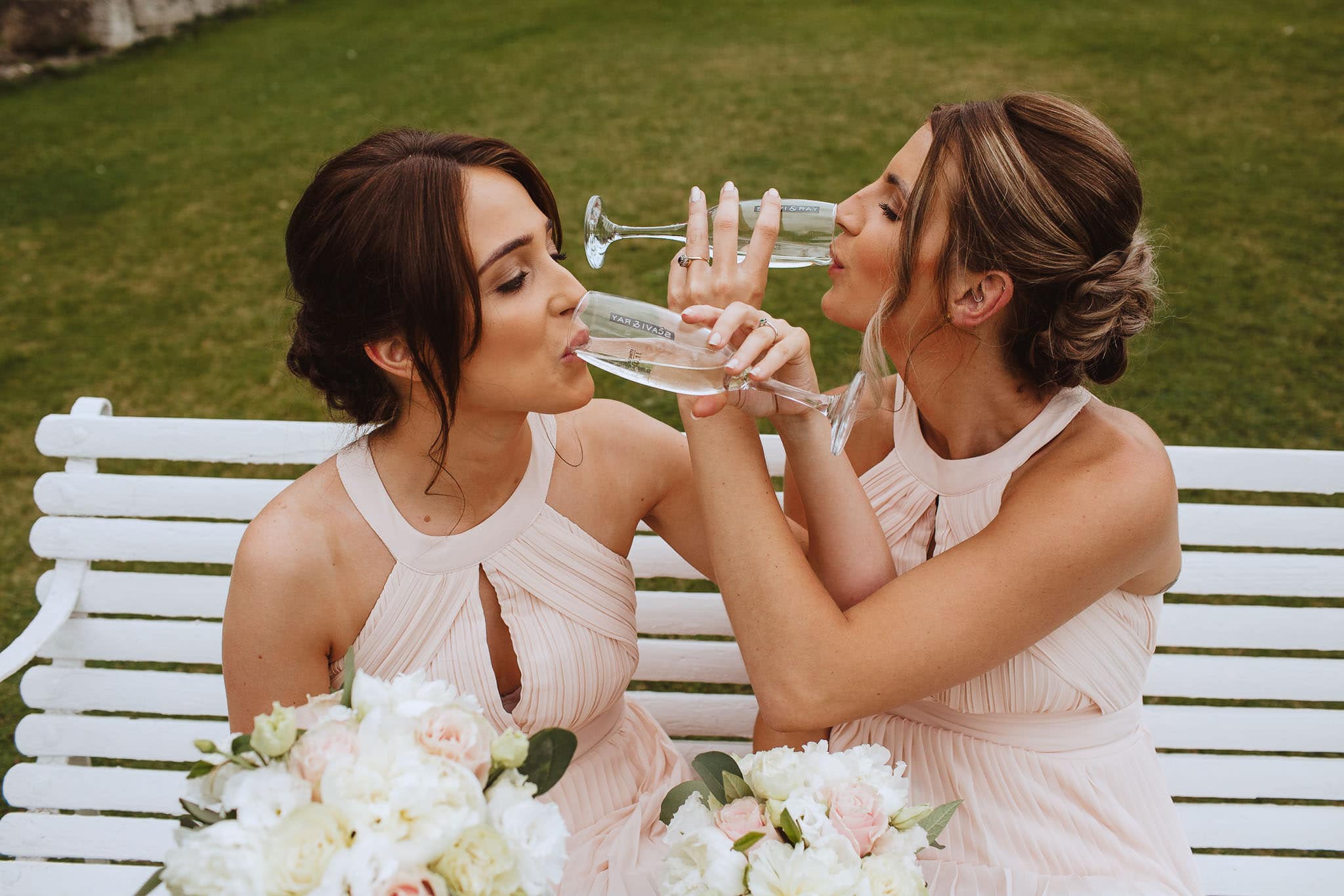 bridesmaids drinking champagne at Hooton Pagnell Hall wedding