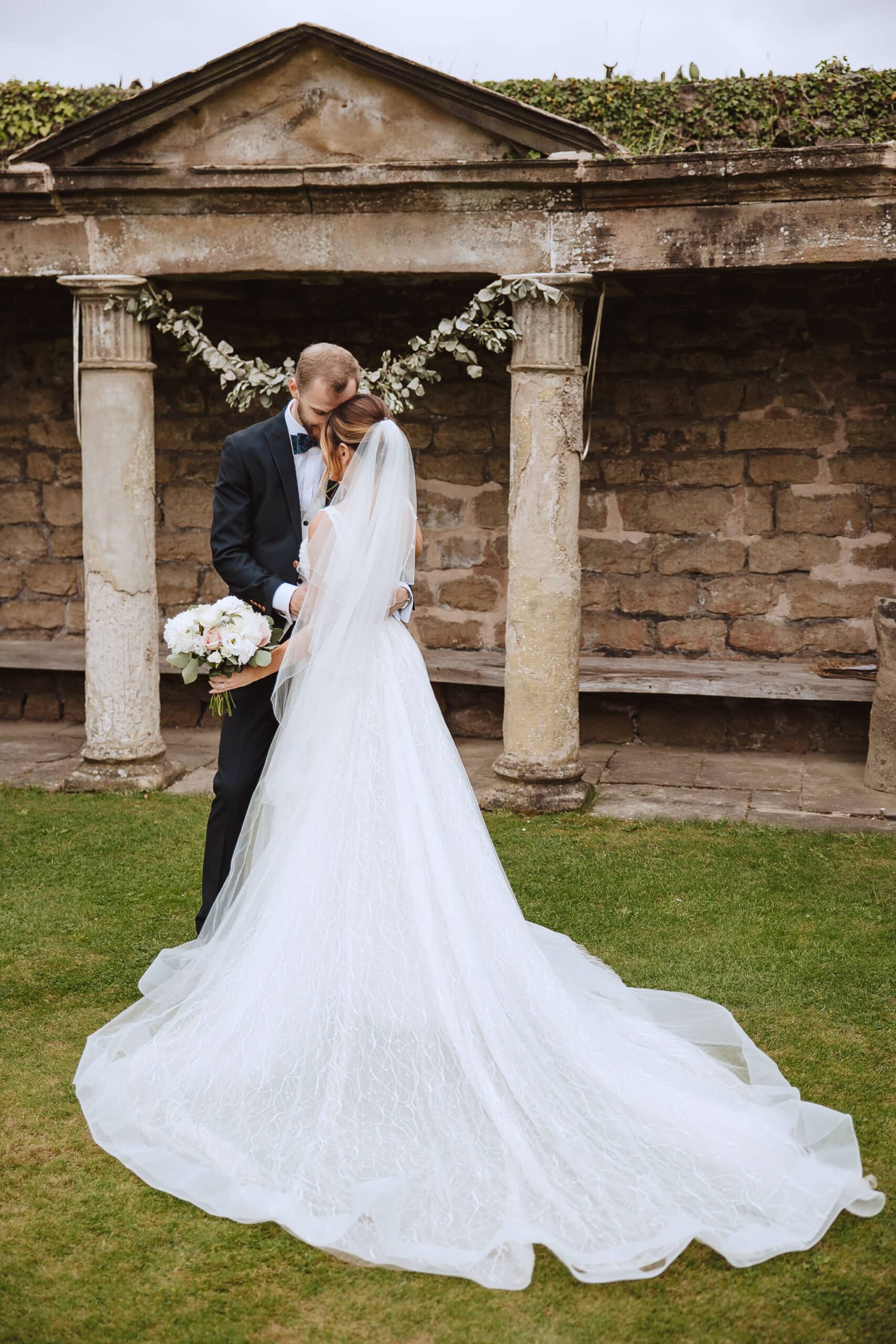 portrait image of the back of stunning sparkly wedding gown