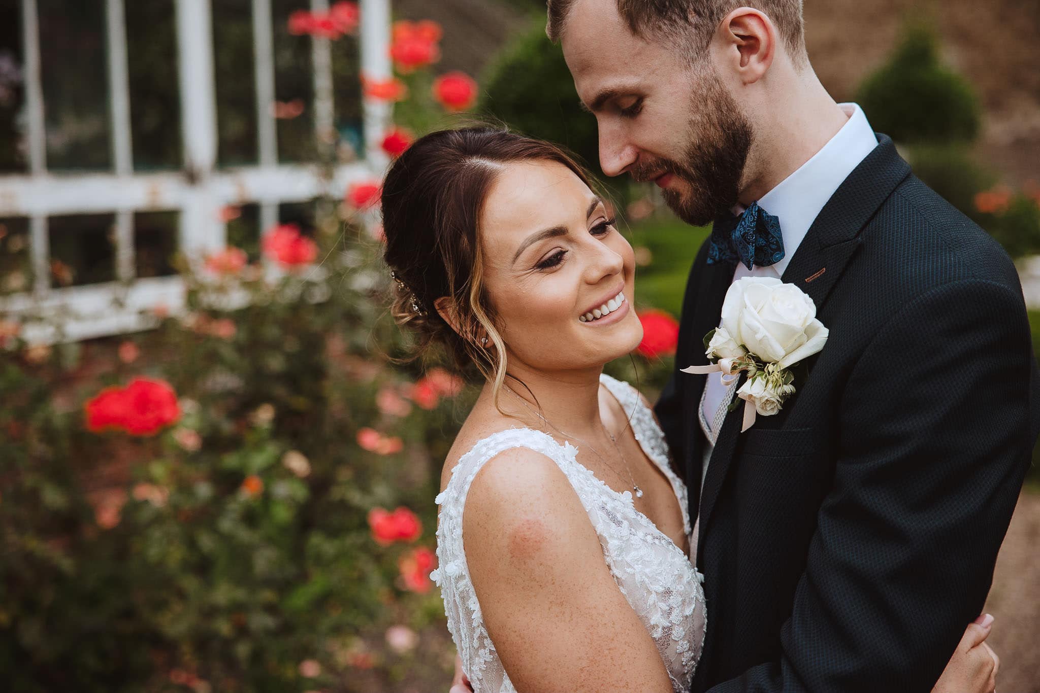portrait in the rose garden at Hooton Pagnell Hall wedding venue Doncaster