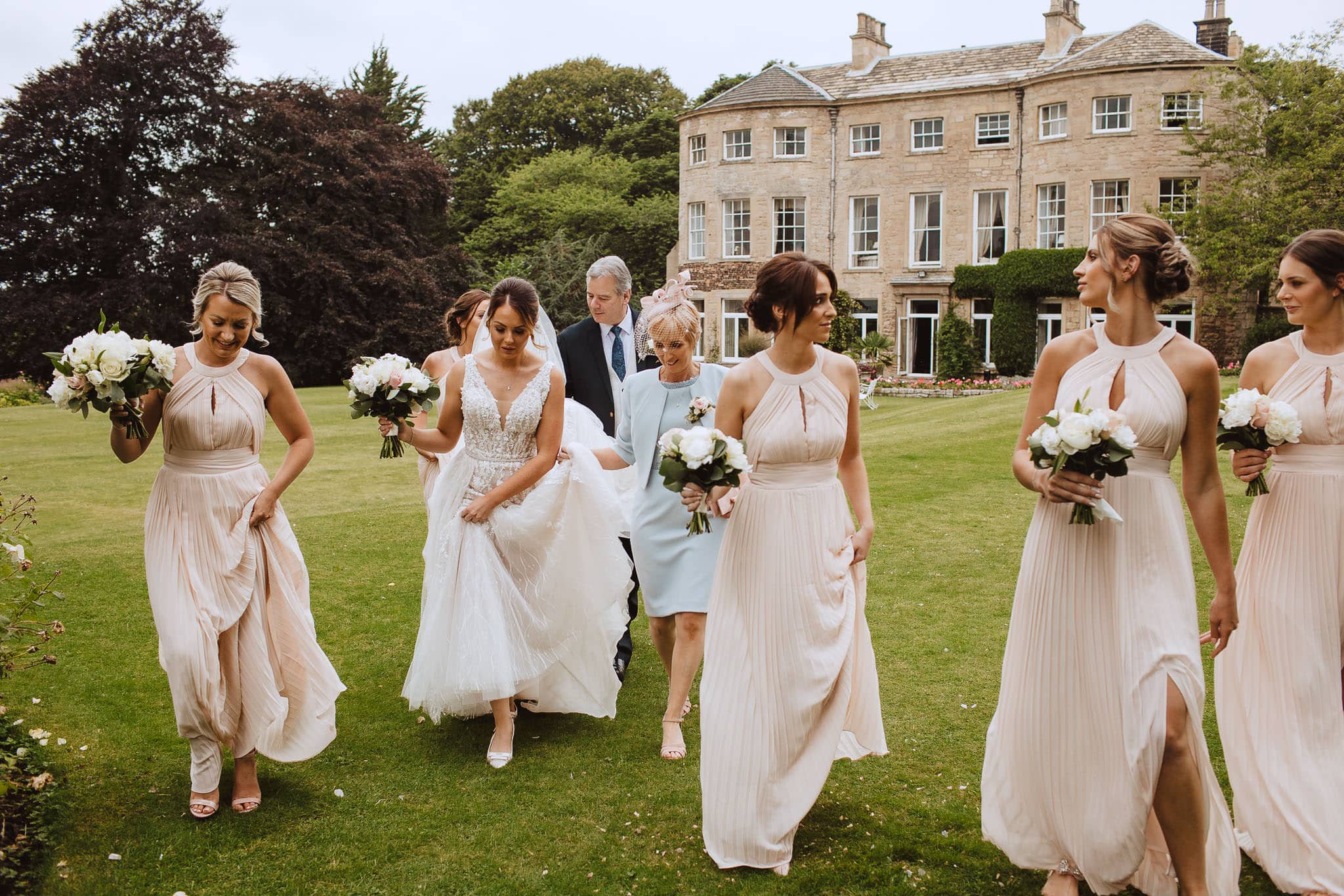 bride and bridesmaids at Hooton Pagnell Hall wedding venue