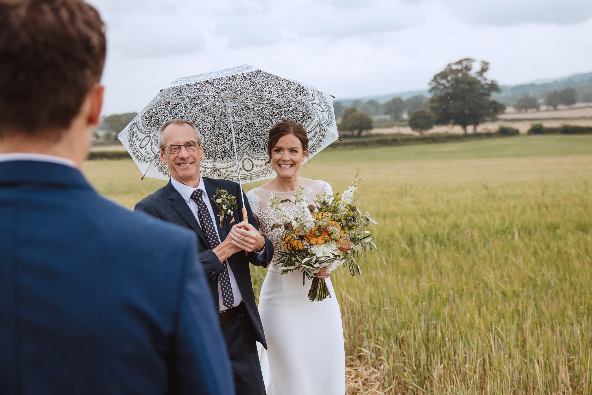 close up of smiling bride greeting her groom in humanist ceremony