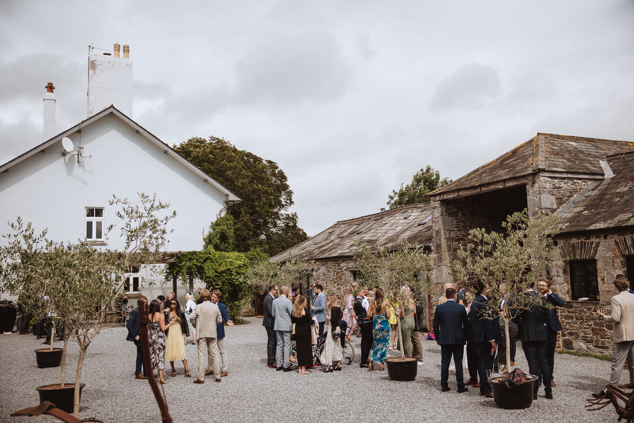 wide shot of wedding guests at Anran barns at Tidwell Farm