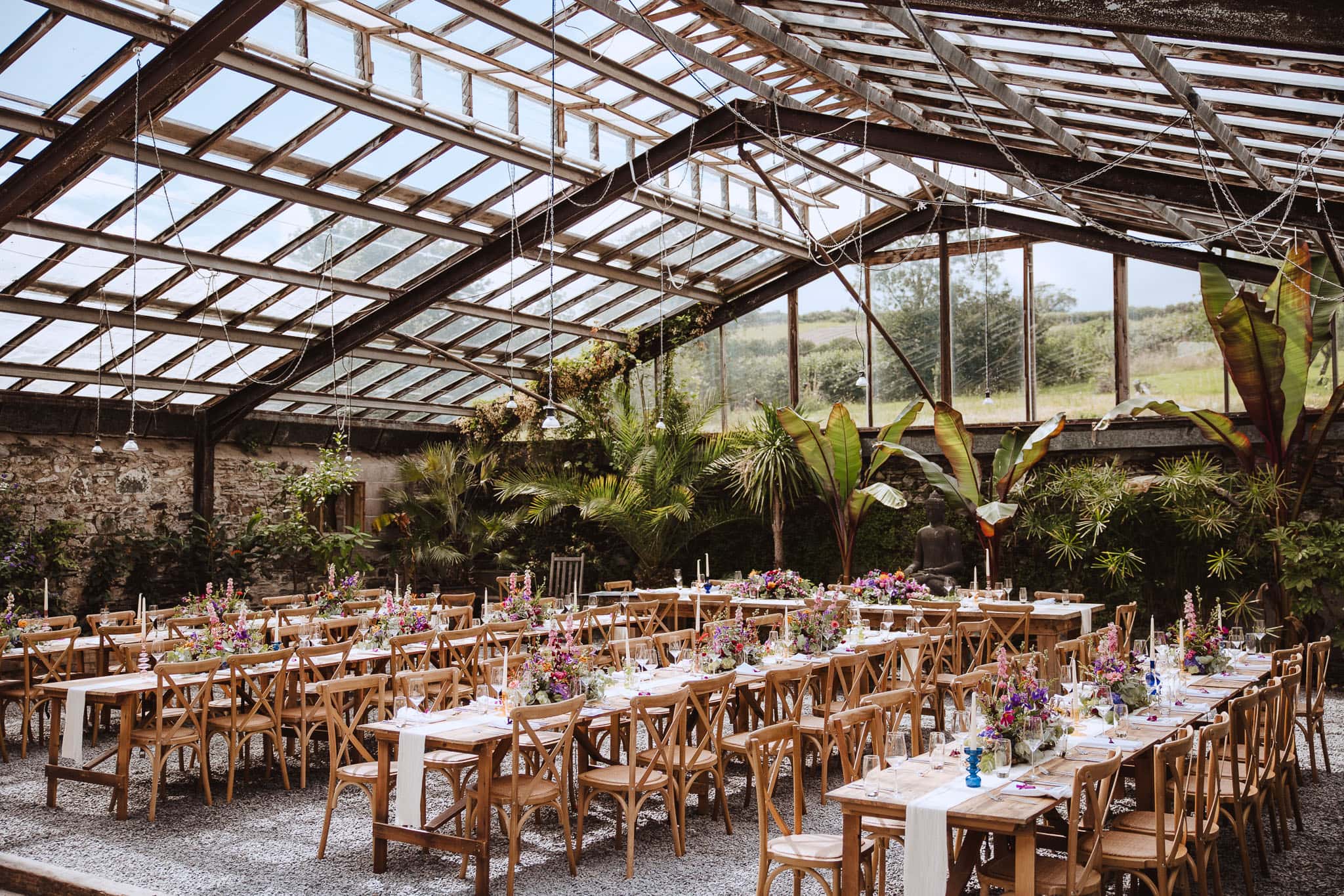 glasshouse set up for wedding breakfast at Anran, Devon