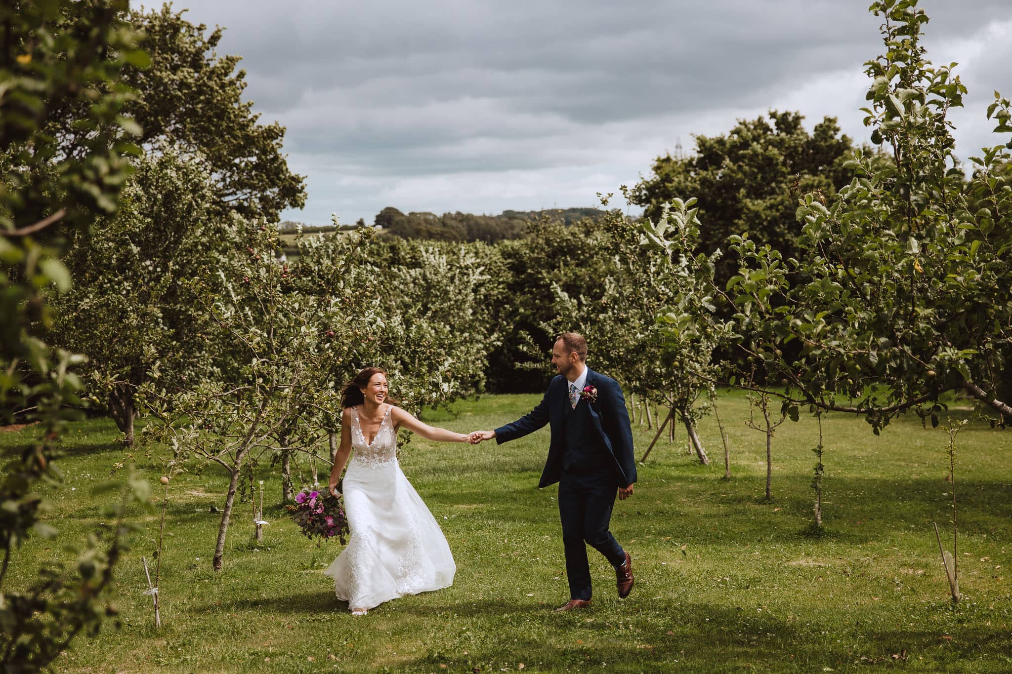 natural wedding portraits in the apple orchard at Anran boutique wedding venue